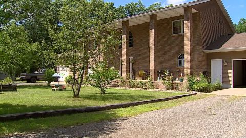 Potential home buyers  saw the KKK application while touring Anderson's home.