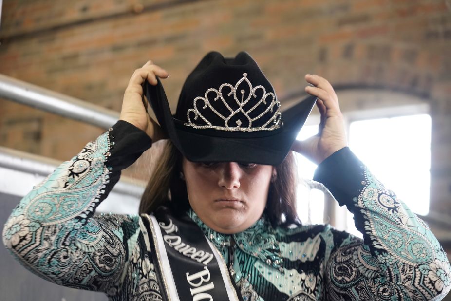A contestant gets ready for the Iowa Cowgirl Queen Contest. According to the state fair's website, the contestants are judged partly by their Western attire and partly on their horsemanship. 