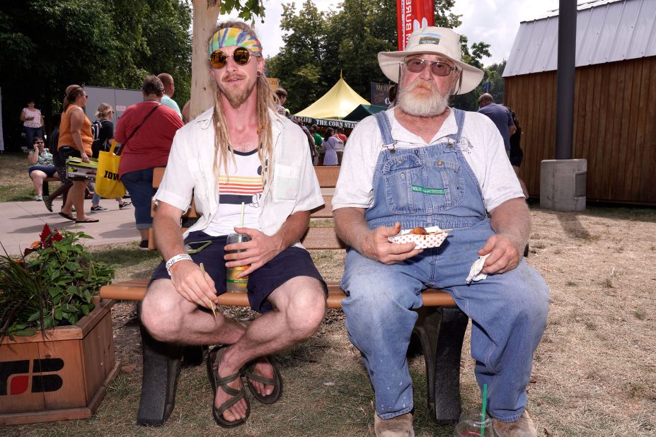 Men take a rest for some food and lemonade on Saturday.