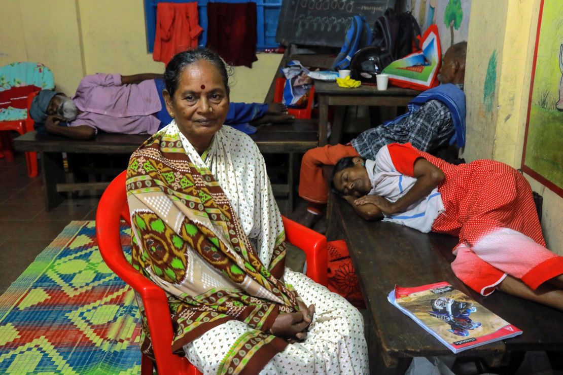 Refugees rest in a relief camp at Eloor in Kochi in the Indian state of Kerala.