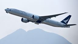A Cathay Pacific passenger plane takes off from Hong Kong's international airport on March 13, 2019.