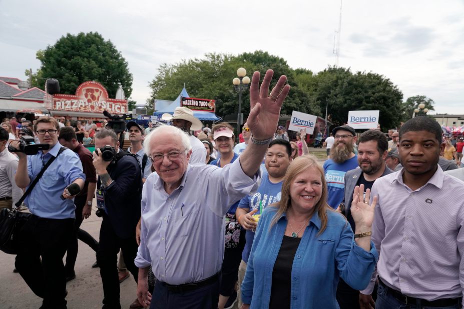 US Sen. Bernie Sanders and his wife, Jane, walk through the fairgrounds on Saturday. Most of the Democratic field visited the fair over the weekend.