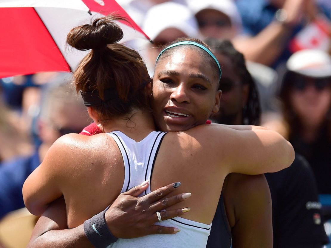 Canada's Bianca Andreescu, left, consoles Serena Williams, of the United States, after Williams had to retire from the final of the Rogers Cup tennis tournament in Toronto on Sunday.