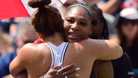 Canada's Bianca Andreescu, left, consoles Serena Williams, of the United States, after Williams had to retire from the final of the Rogers Cup tennis tournament in Toronto on Sunday.