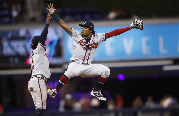 Atlanta's Ozzie Albies, left, and Ronald Acuna Jr. do their trademark postgame celebration after winning in Miami on Friday, August 9.