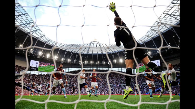 Aston Villa goalkeeper Tom Heaton makes a save against Tottenham during a Premier League match in London on Saturday, August 10.