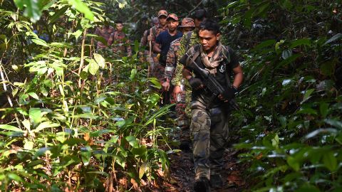 Members of a rescue team take part in the search effort on Monday.