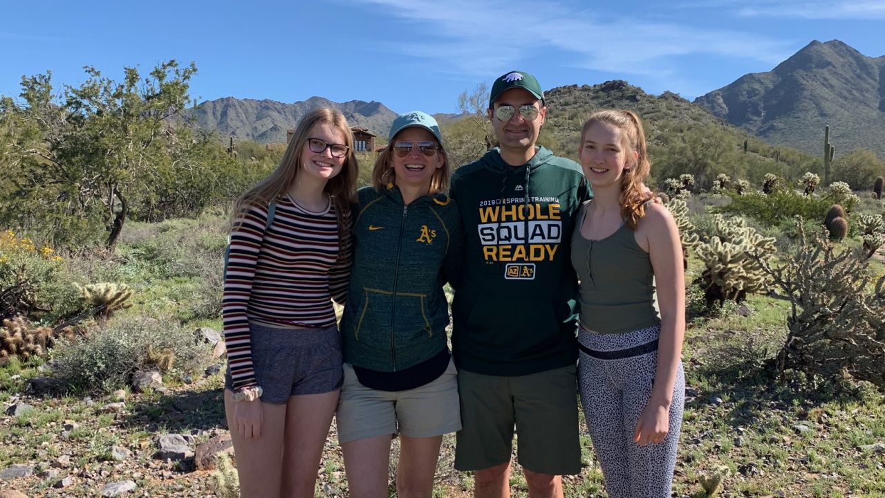 Dave Kaval, president of the Oakland Athletics, with his wife and two teenage daughters.