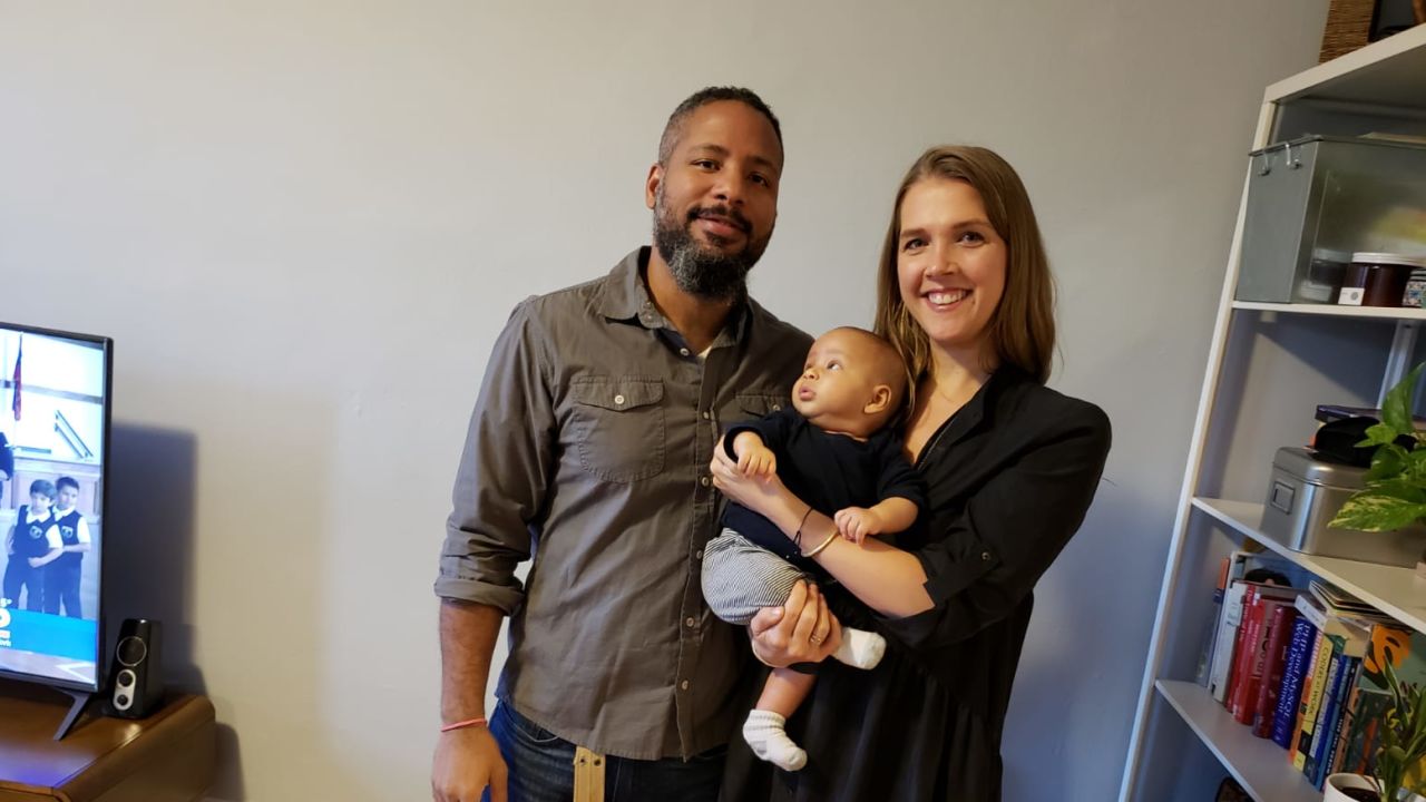 Libby Rodney, chief strategy officer for The Harris Poll, with her husband and son, who is now a year old.
