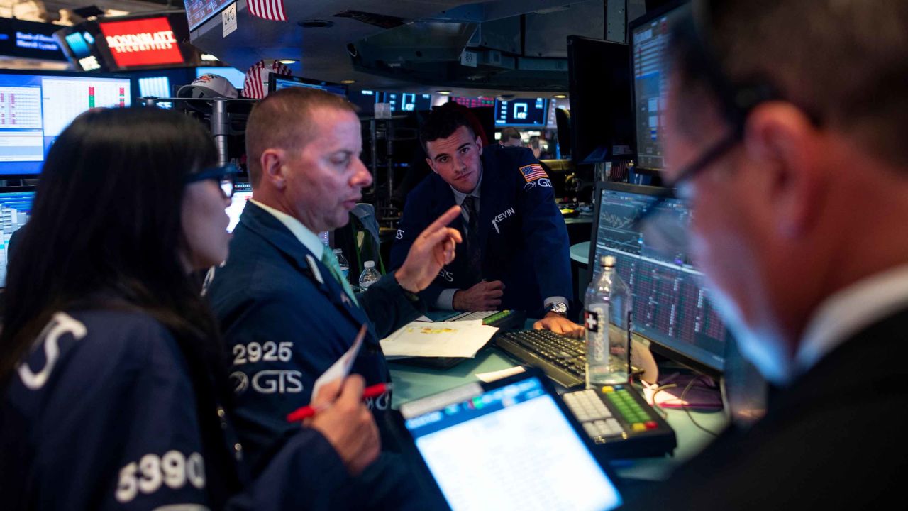 Traders work after the closing bell at the New York Stock Exchange (NYSE) on August 12, 2019 at Wall Street in New York City. - Wall Street stocks finished a bruising session sharply lower as worries about slowing growth and the protracted US-China trade war hit banking shares and the broader market. (Photo by Johannes EISELE / AFP)        (Photo credit should read JOHANNES EISELE/AFP/Getty Images)