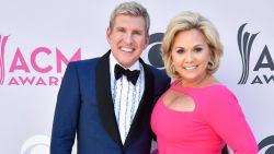 TV personalities Todd Chrisley (L) and Julie Chrisley attend the 52nd Academy Of Country Music Awards at Toshiba Plaza on April 2, 2017 in Las Vegas, Nevada.