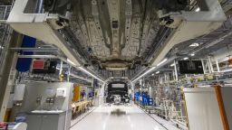 A chassis moves along the VW Golf production line at the Volkswagen AG automobile manufacturing plant in Zwickau, Germany, on Monday, June 17, 2019. VW will spend 1.2 billion ($1.4 billion) retooling Zwickau to make a half-dozen electric models by 2021 but it warns that the payroll is likely to shrink. Photographer: Alex Kraus/Bloomberg via Getty Images