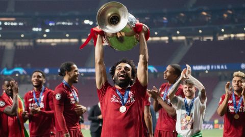 Mohamed Salah lifts the Champions League trophy in Madrid.