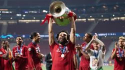 MADRID, SPAIN - JUNE 01: Mohamed Salah of Liverpool lifts the Champions League Trophy following the UEFA Champions League Final between Tottenham Hotspur and Liverpool at Estadio Wanda Metropolitano on June 01, 2019 in Madrid, Spain. (Photo by Matthias Hangst/Getty Images)