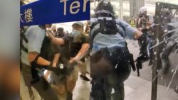 Hong Kong police officer attacked protesters