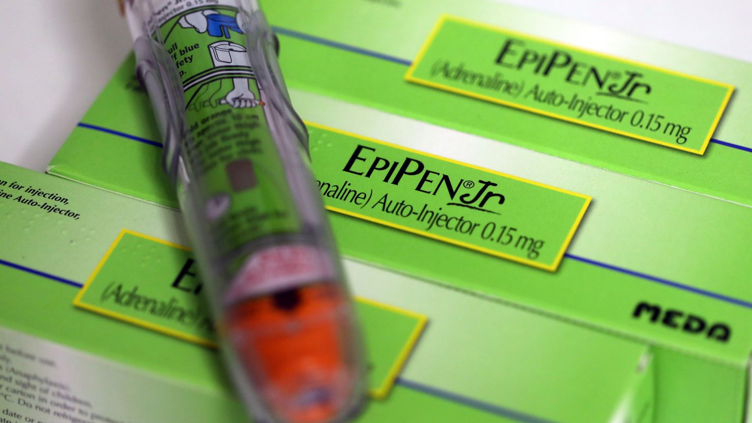 An Epipen Junior epinephrine auto-injector, produced by Meda AB, sits on a pharmacy counter in this arranged photograph in London, U.K., on Thursday, Dec. 29, 2016. The rapid pace of innovation among drugmakers may continue to be overshadowed by broader investment themes, such as the switch away from defensive stocks into more cyclical industries, during 2017, according to Bloomberg Intelligence. Photographer: Chris Ratcliffe/Bloomberg via Getty Images
