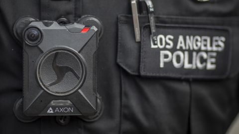 A Los Angeles police officer wears an Axon body camera in 2017. Axon said earlier this year that it would not install facial-recognition technology in its body cameras, stating it's "not currently reliable enough." (Photo by David McNew/Getty Images)