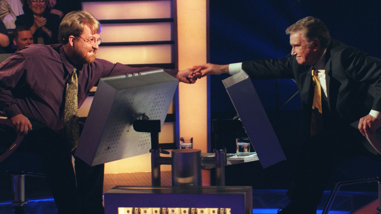 Contestant Doug Van Gund with Regis Philbin on 'Who Wants to Be a Millionaire' in 1999.(Photo By Getty Images)