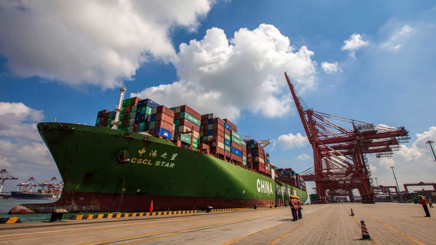 This photo taken on August 6, 2019 shows a cargo ship berthing at Qingdao port in Qingdao in China's eastern Shandong province. - China's good shipments abroad beat expectations to rise in July while its purchases continued to shrink, official data showed on August 8. (Photo by STR / AFP) / China OUT (Photo credit should read STR/AFP/Getty Images)