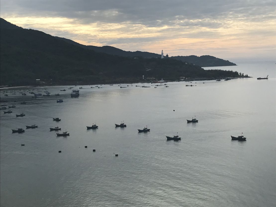 Vietnamese fishing boat are anchored off the beach in Da Nang, Vietnam, just across the highway from the Paracel Islands Museum.