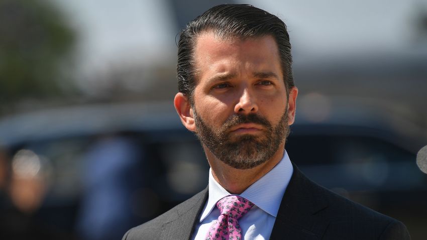 Donald Trump, Jr. looks on upon arrival at General Mitchell International Airport, with  US President Donald Trump, in Milwaukee, Wisconsin on July 12, 2019. - Trump will be in Milwaukee to visit an aerospace company and attend a fundraiser. (Photo by MANDEL NGAN / AFP)        (Photo credit should read MANDEL NGAN/AFP/Getty Images)