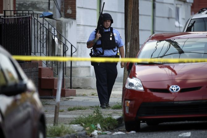 Officers swarmed the neighborhood after the shooting began.