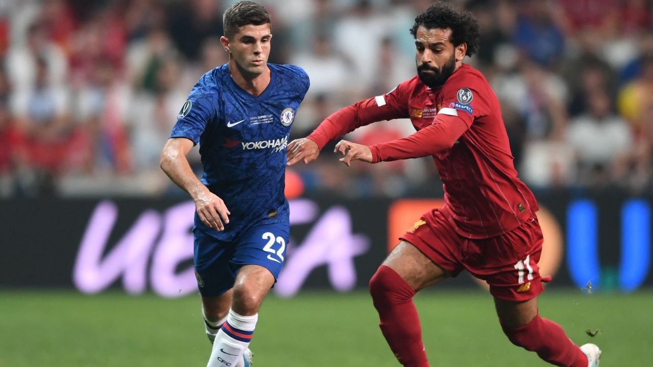 Pulisic battles for the ball with Liverpool's Mohamed Salah during the UEFA Super Cup.