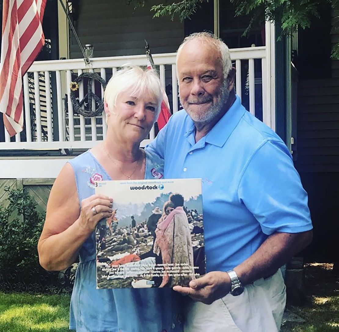 Bobbi and Nick Ercoline, holding the famous album cover they are featured on.