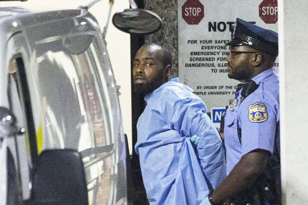 Police take shooting suspect Maurice Hill into custody after <a href="https://www.cnn.com/2019/08/15/us/philadelphia-shooting-thursday/index.html" target="_blank">a nearly eight-hour standoff</a> ended in Philadelphia on Thursday, August 15. Six police officers were wounded in the standoff, which began when police attempted to serve a narcotics warrant on a row house.