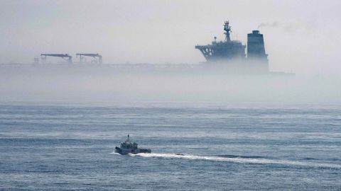 The Grace 1 supertanker looms among the sea fog off the coast of Gibraltar.