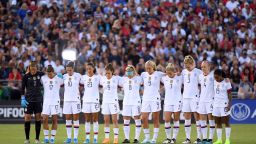 PASADENA, CALIFORNIA - AUGUST 03:  The United States women's soccer team stand for a moment of silence in honor of the victims in the El Paso, Texas shooting earlier today before the first game of the USWNT Victory Tour against the Republic of Ireland at Rose Bowl on August 03, 2019 in Pasadena, California. (Photo by Harry How/Getty Images)