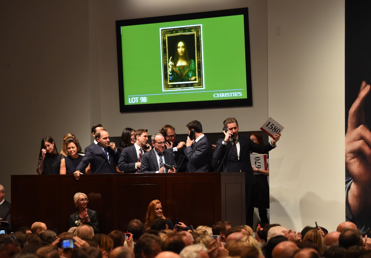 Rotter (far right) during the sale of the "Salvator Mundi" at Christie's New York. 