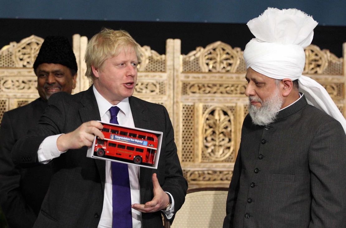 Boris Johnson meets members of the Baitul Fatuh Mosque during the National Peace Symposium in 2012, while he was London Mayor.