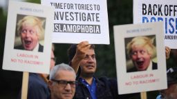 UXBRIDGE, ENGLAND - AUGUST 09:  Local people protest outside the Hillingdon Conservative Association office on August 9, 2018 in Uxbridge, England. Today's protest is being held following comments made by former Foreign Secretary, Boris Johnson, against the wearing of Burkas by Muslim women in the United Kingdom.An independent panel will investigate complaints made regarding Mr Johnson's comments and possible breaches of the Conservative Party code of conduct.  (Photo by Christopher Furlong/Getty Images)