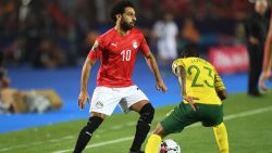 Egypt's forward Mohamed Salah (L) is marked by South Africa's midfielder Thembinkosi Lorch during the 2019 Africa Cup of Nations (CAN) Round of 16 football match between Egypt and South Africa at the Cairo International Stadium in the Egyptian Capital on July 6, 2019. (Photo by OZAN KOSE / AFP)        (Photo credit should read OZAN KOSE/AFP/Getty Images)
