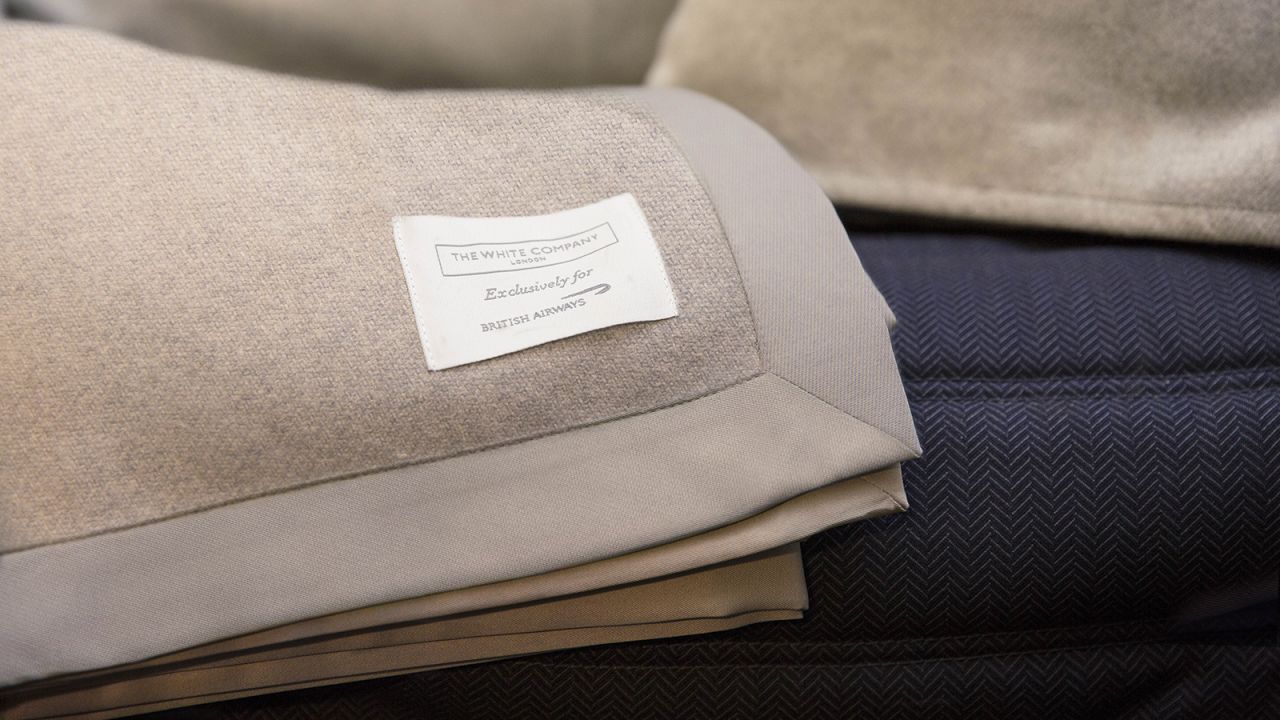 <strong>White Company: </strong>Bedding is by the White Company. In First, passengers can slip into Temperley London loungewear and slippers. 