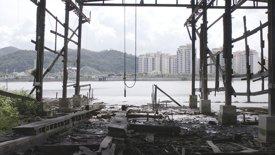 Tam's makeshift studio is an abandoned shipyard in the coastal Lai Chi Vun village. 