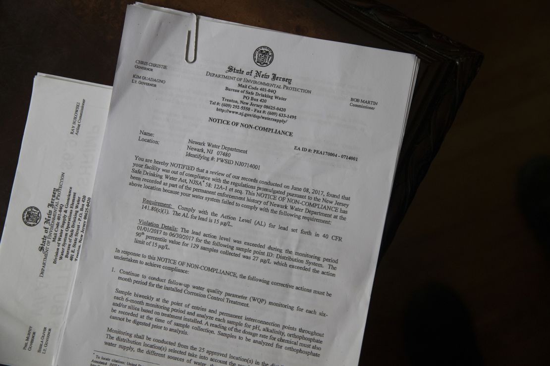 A copy of a state order to the city of Newark sits on a table in Shakima Thomas' home.
