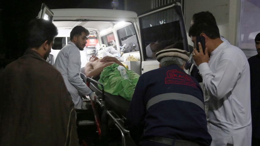A wounded man is carried to a hospital after an explosion at wedding hall in Kabul, Afghanistan, Sunday, Aug.18, 2019. An explosion ripped through a wedding hall on a busy Saturday night in Afghanistan's capital and dozens of people were killed or wounded, a government official said. Hundreds of people were believed to be inside. (AP Photo/Nishanuddin Khan)