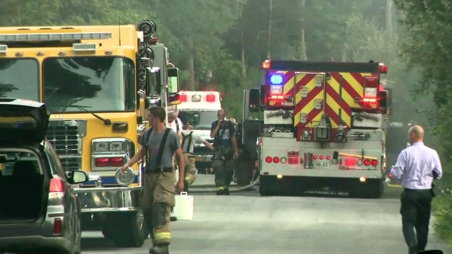 Firefighters respond to a plane crash in Union Vale, New York, on Saturday. 