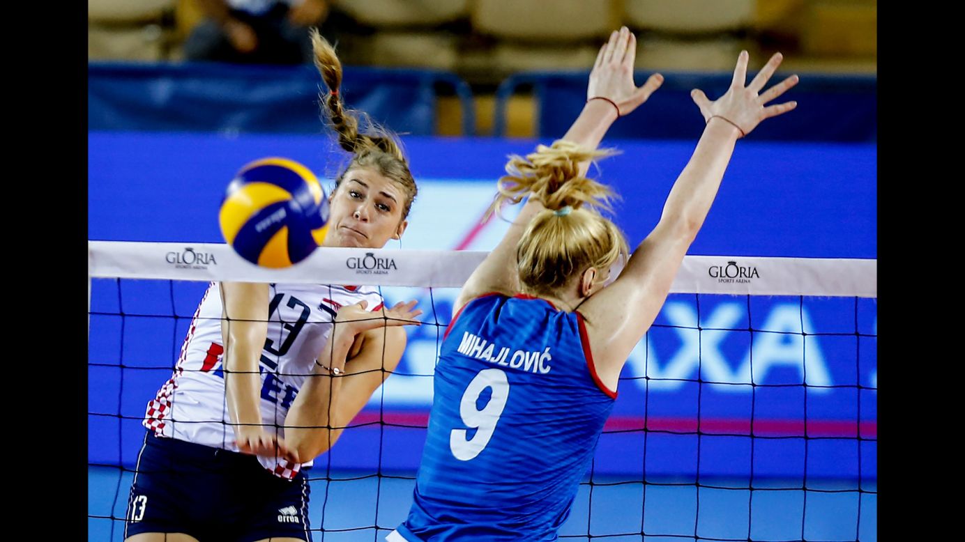 Samantha Fabrist of Croatia spikes a ball past Brankica Mihajlovic of Serbia during the Women's Volleyball Gloria Cup volleyball tournament in Antalya, Turkey, on August 16.