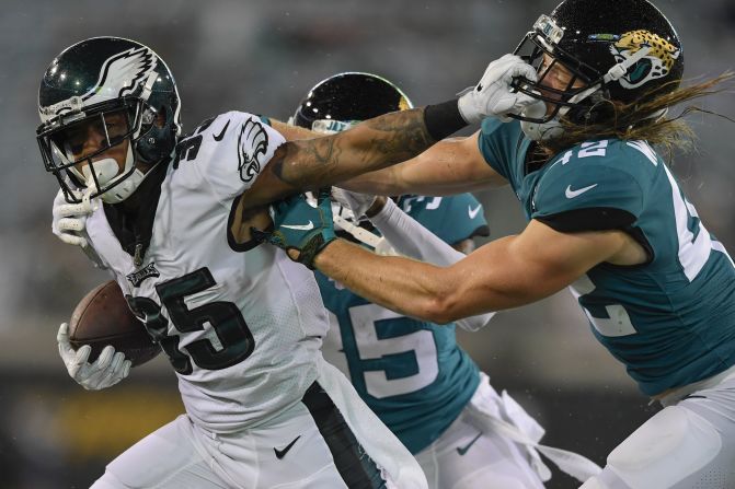 Philadelphia Eagles running back Donnel Pumphrey stiff arms Jacksonville Jaguars defensive back Andrew Wingard during the fourth quarter of an NFL preseason football game in Jacksonville, Florida, on August 15.