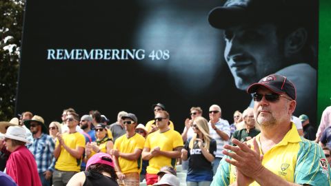 Spectators pay tribute to former cricketer Phillip Hughes.