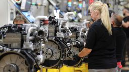 14 August 2019, North Rhine-Westphalia, Cologne: Employees of the engine manufacturer Deutz work on the production of diesel engines. Photo: Oliver Berg/dpa (Photo by Oliver Berg/picture alliance via Getty Images)