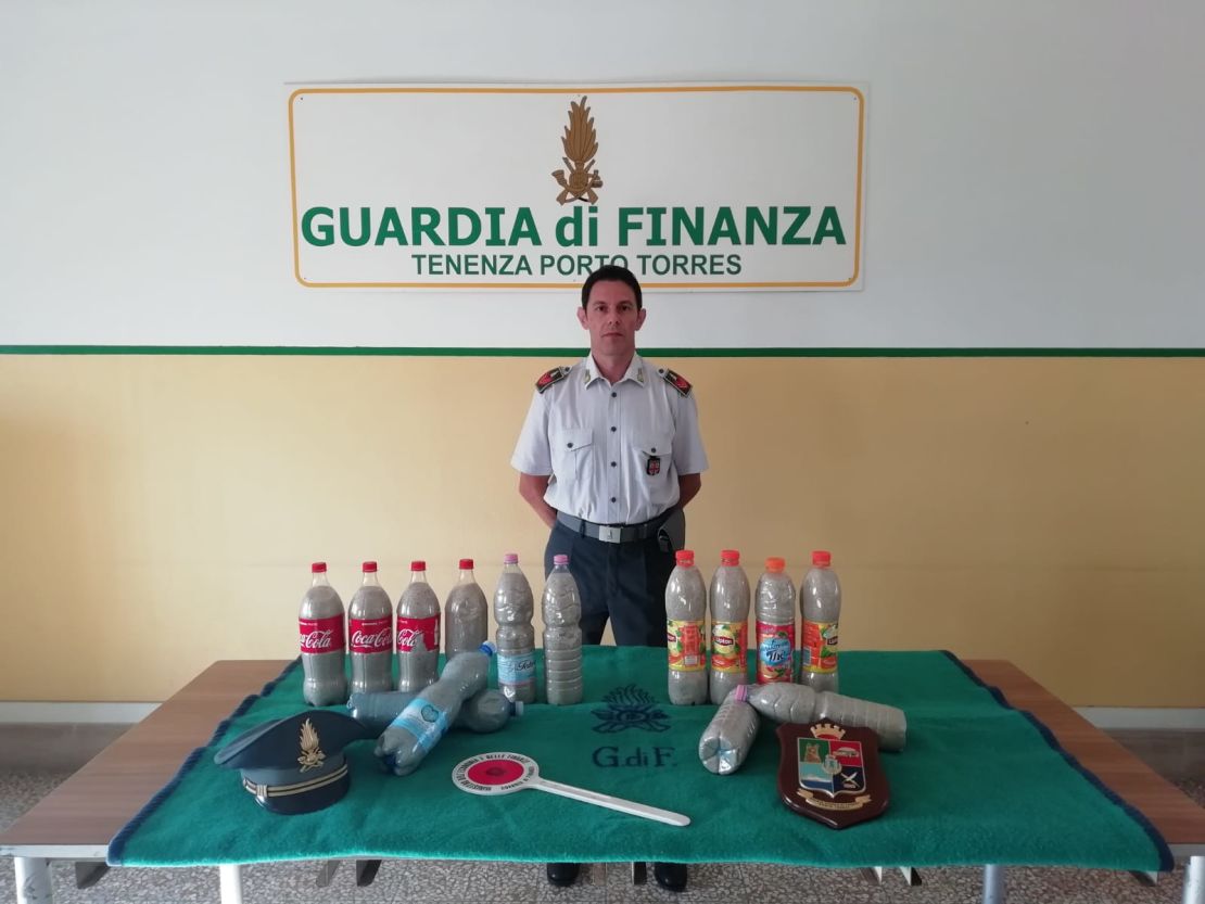 Police seized 14 bottles containing around 40 kilograms of sand.