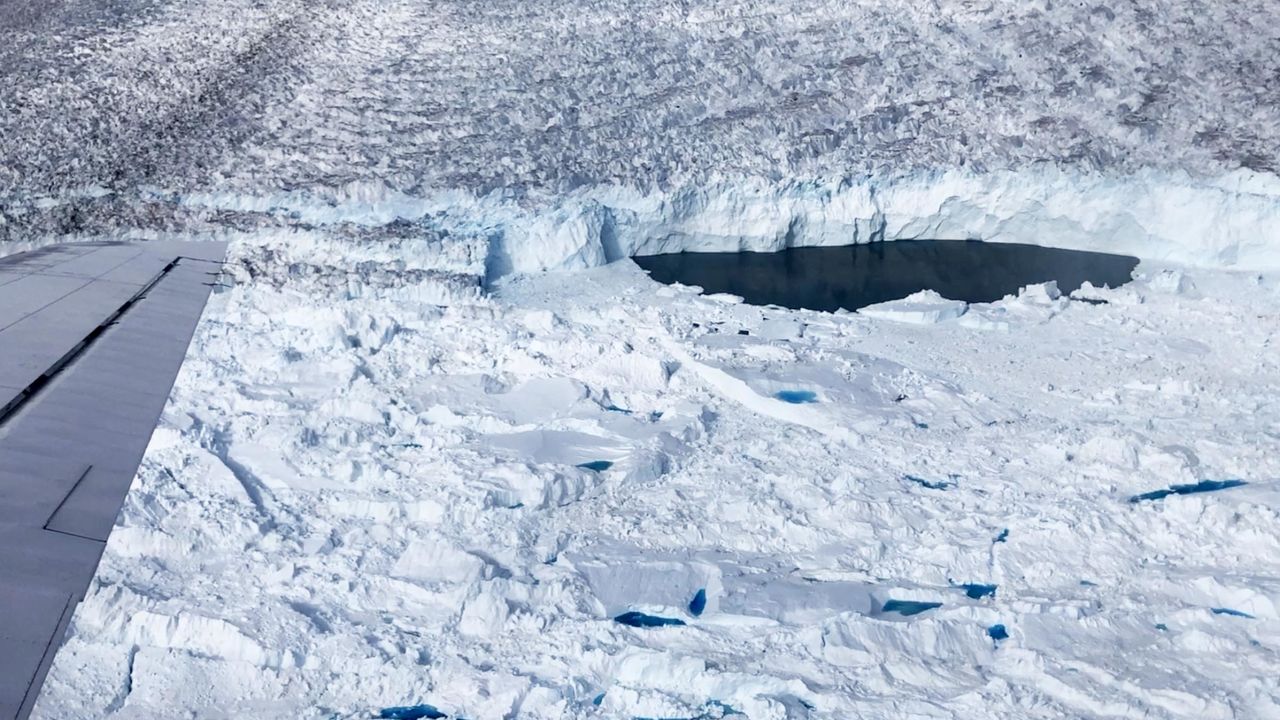 Ice-free "lake" at the front of Helheim glacier seen from a DC-3 plane.