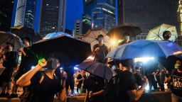 Protesters stand on Harcourt Road overlooking the Legislative Council during a rally in Hong Kong on August 18, 2019, in the latest opposition to a planned extradition law that has since morphed into a wider call for democratic rights in the semi-autonomous city. - Hong Kong democracy activists gathered August 18 for a major rally to show the city's leaders their protest movement still attracts wide public support despite mounting violence and increasingly stark warnings from Beijing. (Photo by Lillian SUWANRUMPHA / AFP)        (Photo credit should read LILLIAN SUWANRUMPHA/AFP/Getty Images)