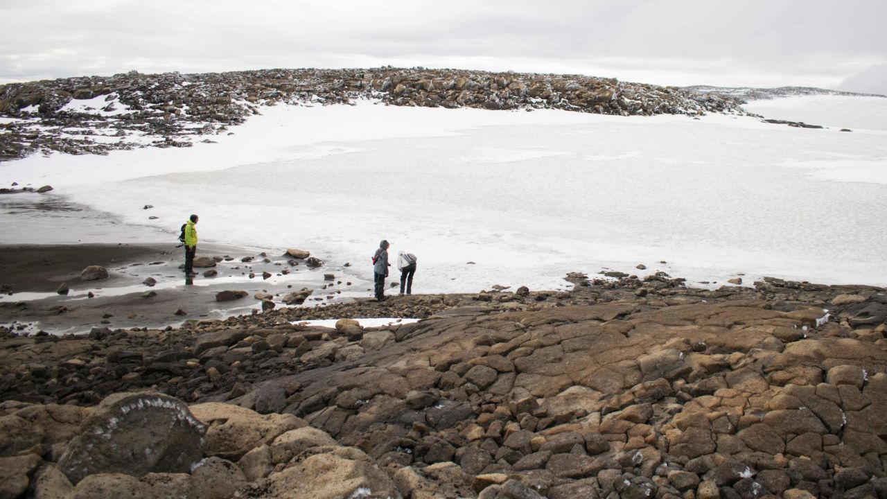 People at the site of the Okjökull glacier after a monument was unveiled there.