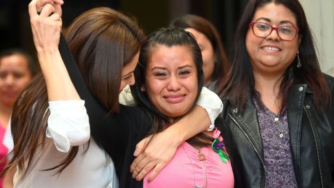 Salvadorean rape victim Evelyn Hernandez (C) celebrates with her lawyers after being cleared of murder after giving birth to a stillborn baby at home in 2016, at Ciudad Delgado's court in San Salvador on August 19, 2019. El Salvador has an extremely strict abortion ban.