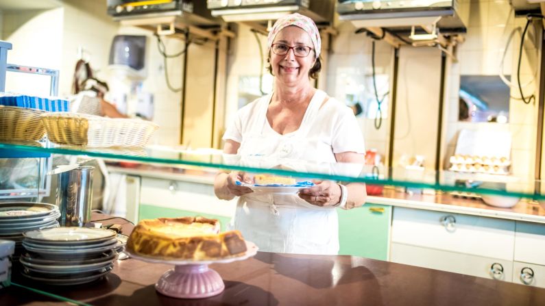 <strong>Bakers have their specialties.</strong> Judith Siöberg, one of 23 senior-aged part-time employees, has worked at the café since it opened in 2015. "It's a crazy house. It's a lot of fun," said Siöberg, whose specialty is "American cheesecake."